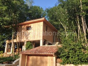 Photo de la Maisons de vacances chalet sur pilotis en perigord à Carsac-Aillac